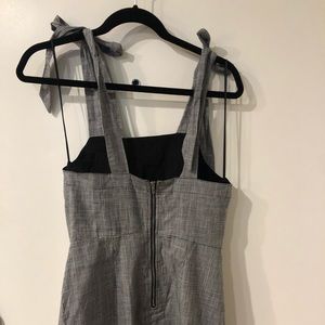 William B black and white mini dress. Bow tie straps and zip up back.
